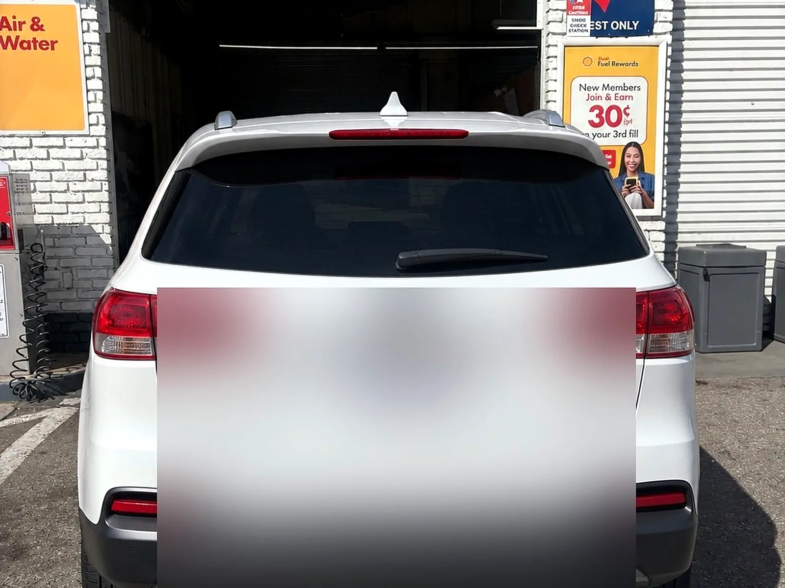 Out-of-state vehicle smog check in Garden Grove, CA: white SUV at our test bay